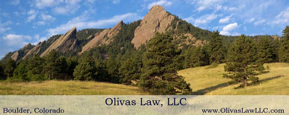 header portion of website featuring a photo of Colorado and the words Olivas Law, LLC